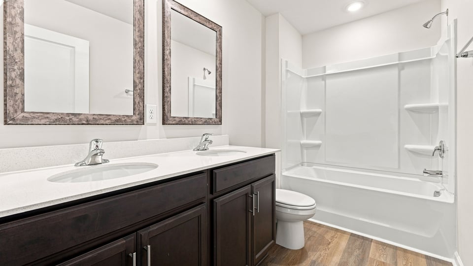 Bathroom with double vanity sinks.