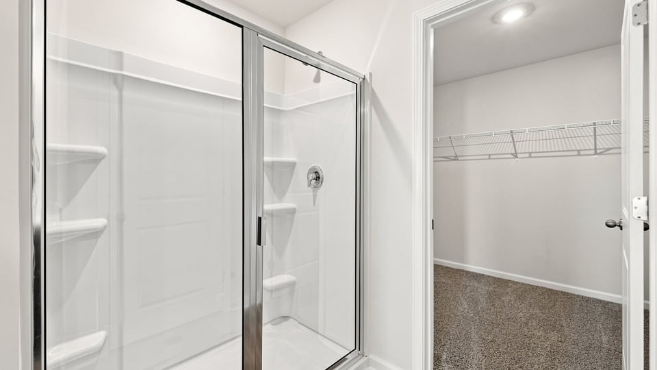 Primary bathroom with double vanity sinks.