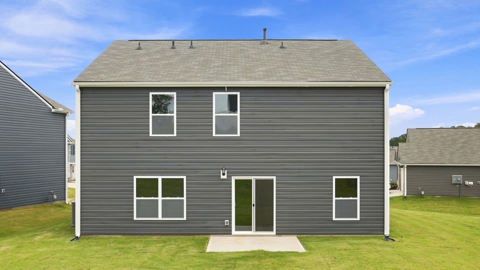 Large backyard of home.