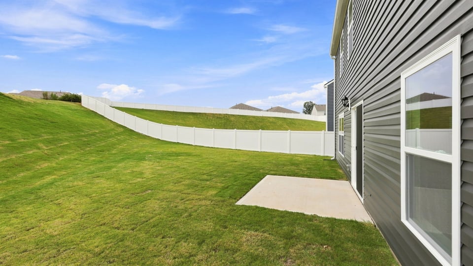 Large backyard of home.