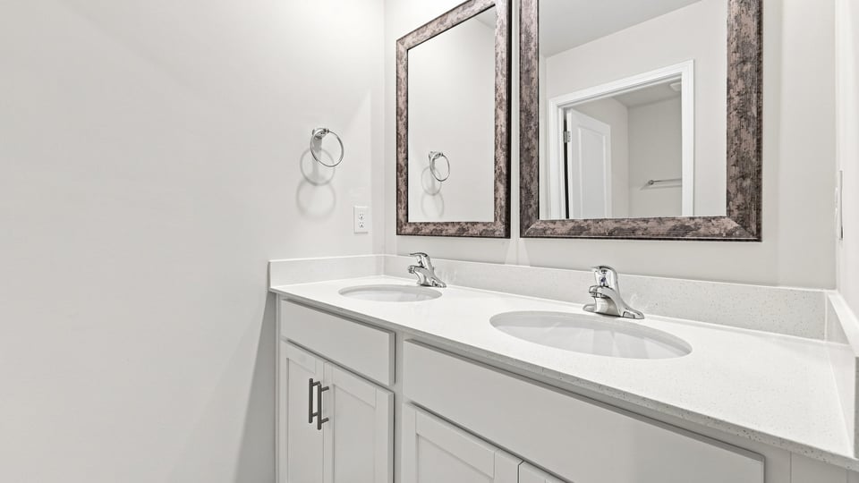 Bathroom with double vanity sink.