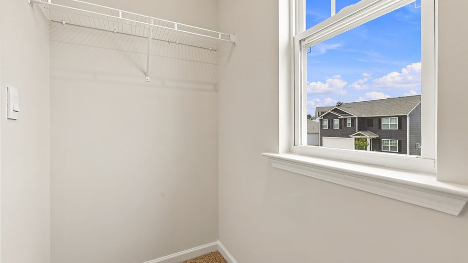 Primary closet wiath window.
