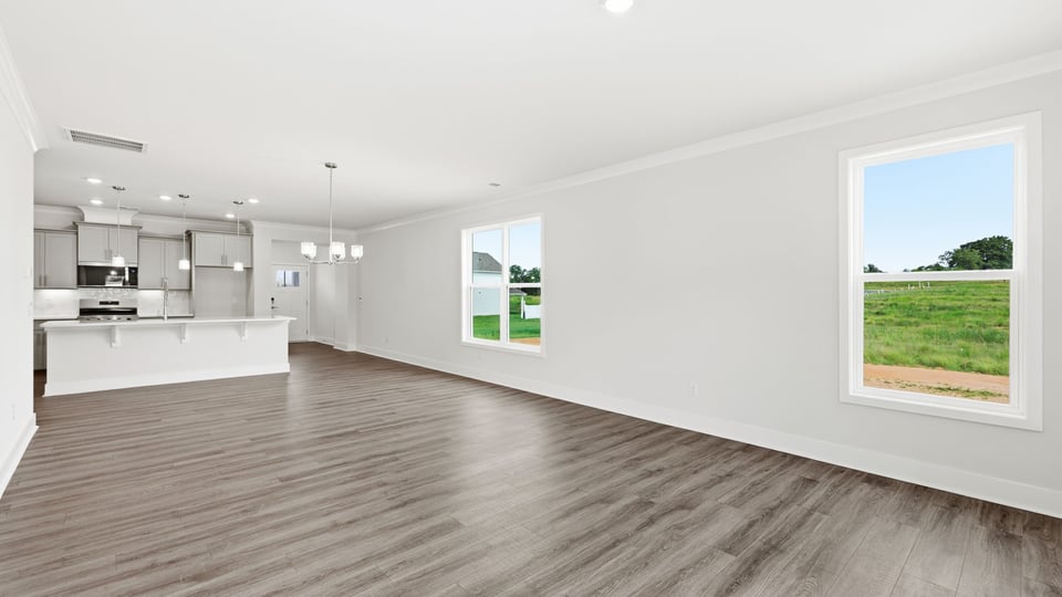 Kitchen and quartz countertops and stainless steel appliances.