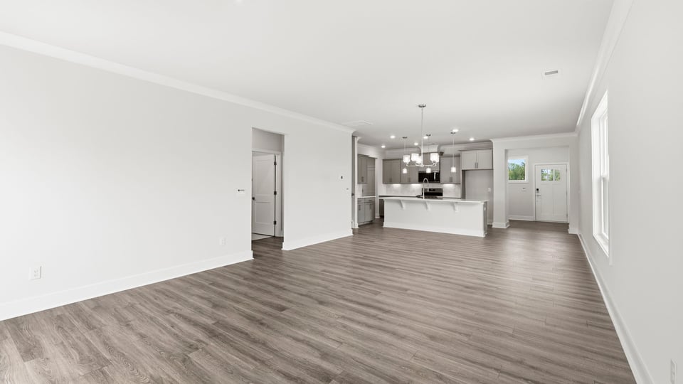 Kitchen and quartz countertops and stainless steel appliances.