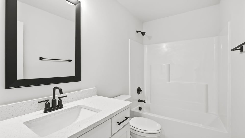 Bathroom with single vanity sink.