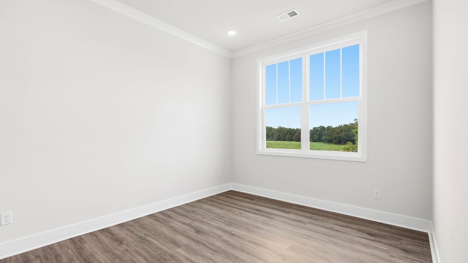 Bedroom with windows.