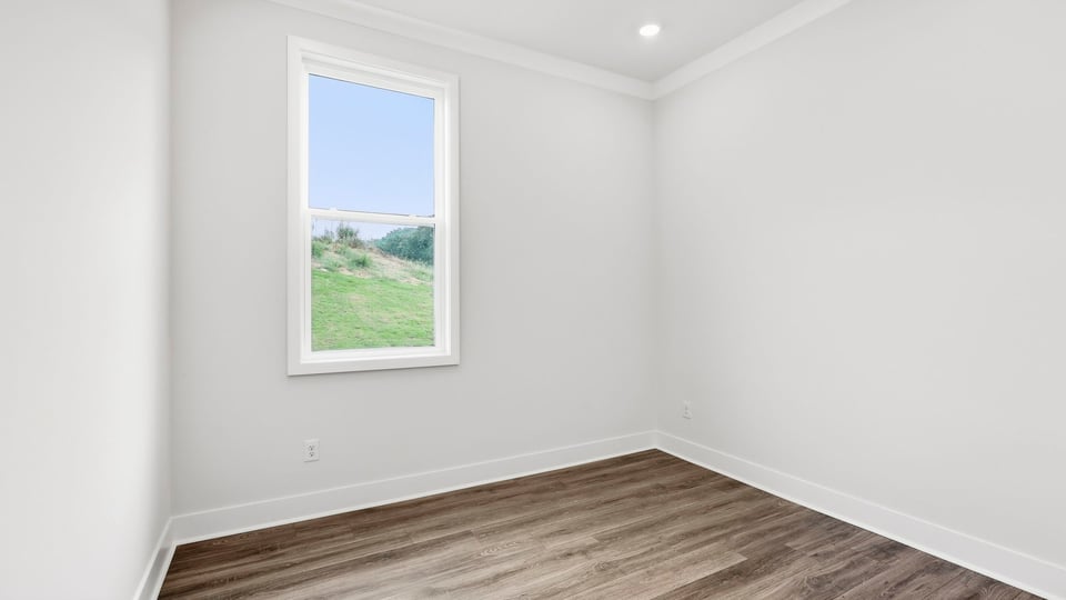 Bedroom with windows.