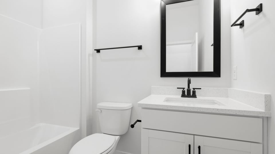Bathroom with single vanity sink.