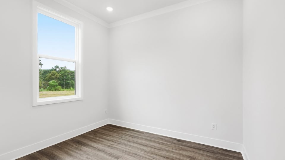 Bedroom with windows.
