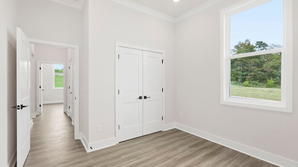 Bedroom with windows.