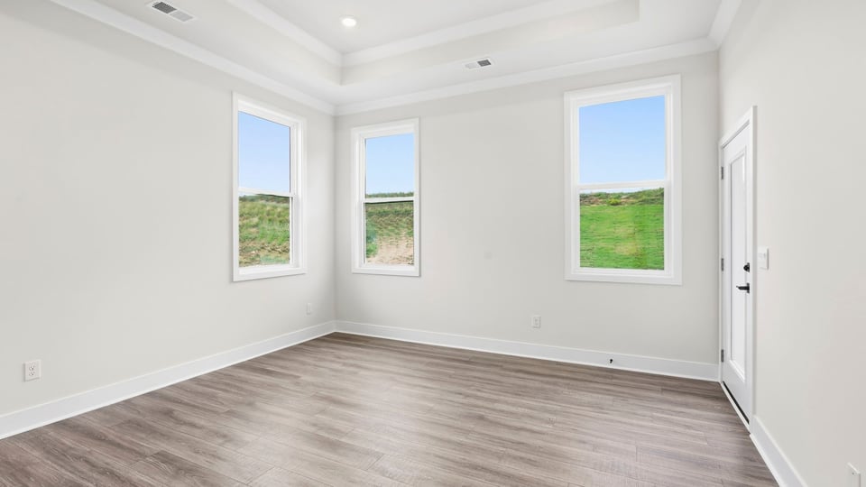 Bedroom with windows.