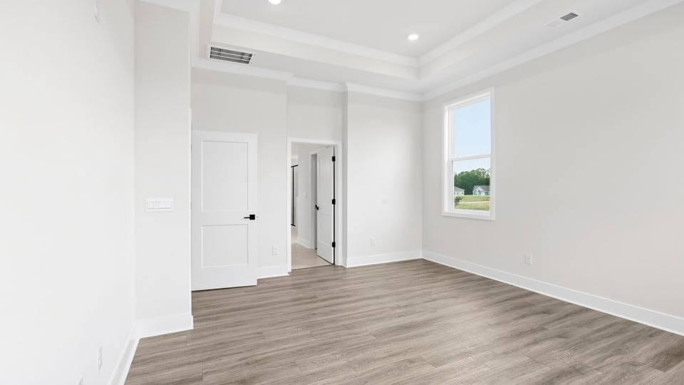Bedroom with windows.