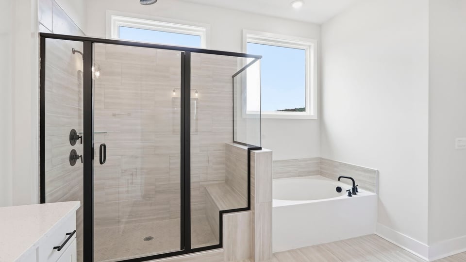 Bathroom with walk in shower.