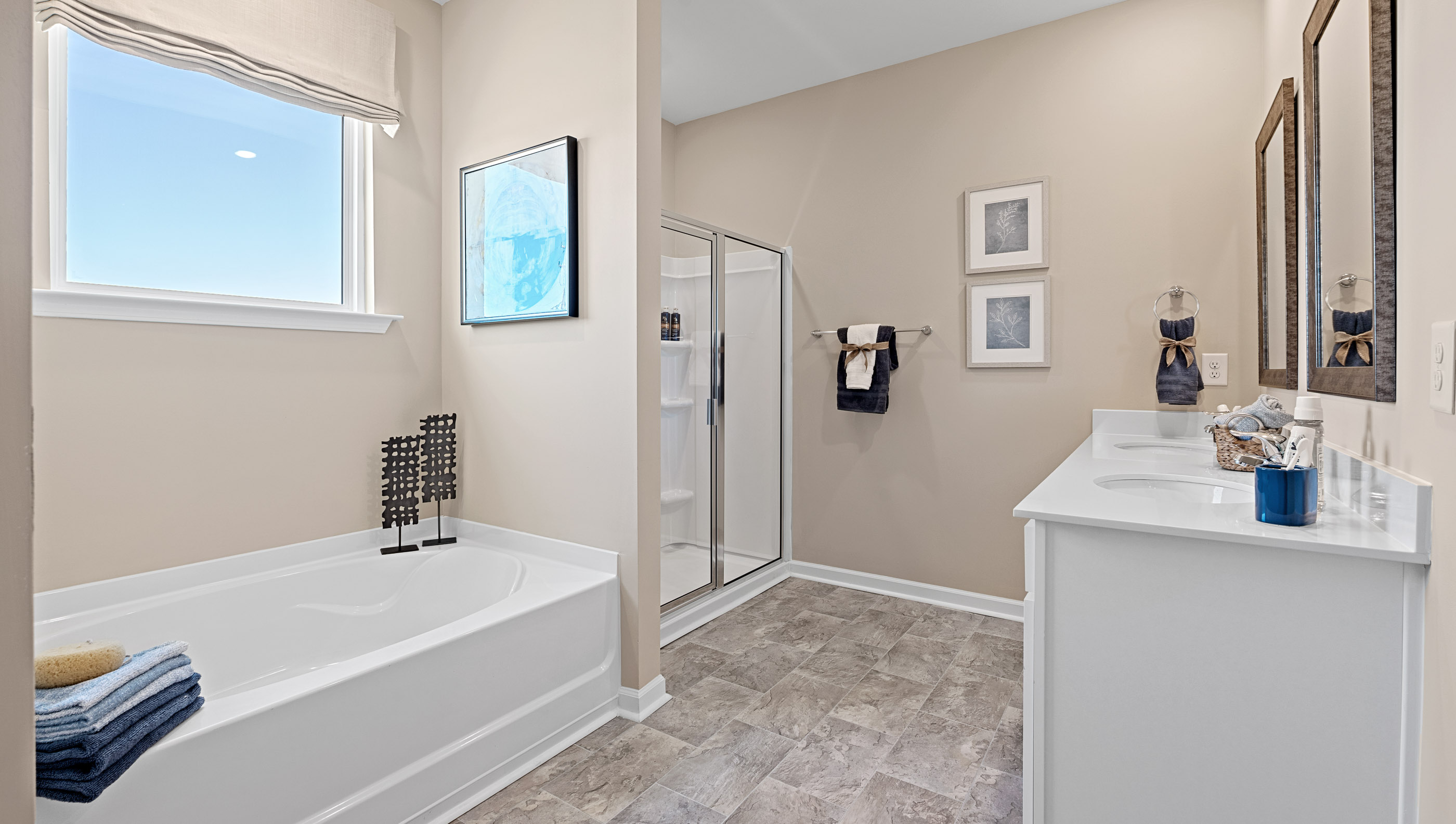Bathroom with bathtub and walk in shower.