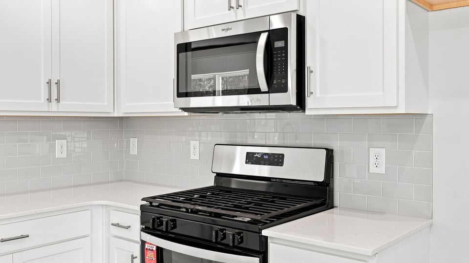 Kitchen with stainless steel appliances.