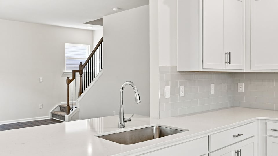 Kitchen with stainless steel appliances.