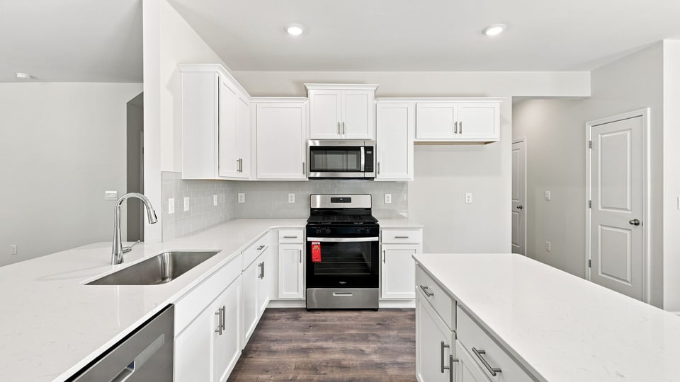 Kitchen with stainless steel appliances.