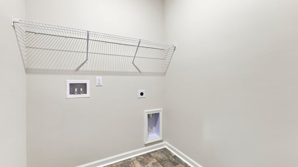 laundry room with hanging storage racks.