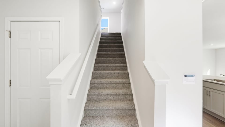 Stairs to bedrooms.