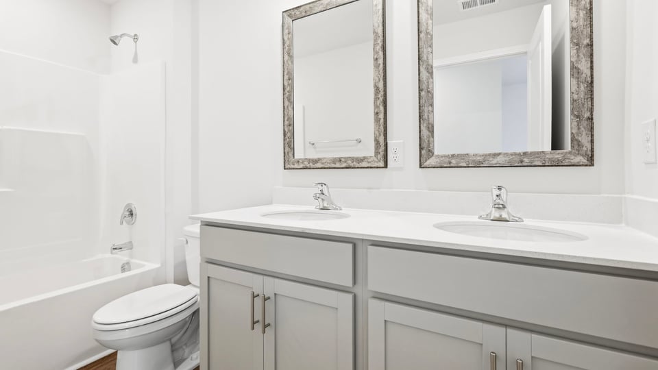 Bathroom with double vanity sink.