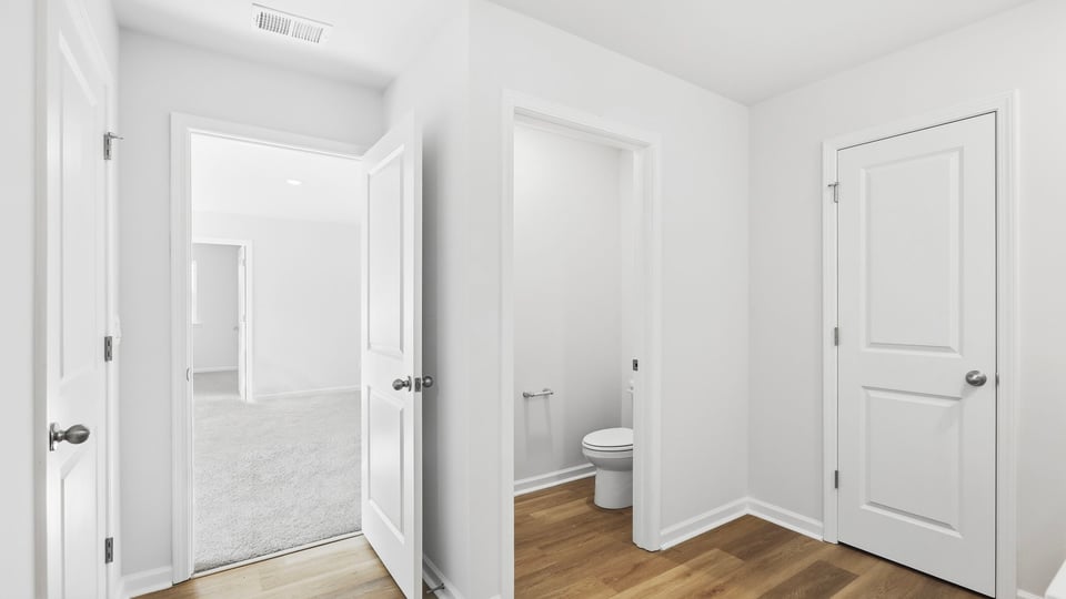 Bathroom with walk in shower.