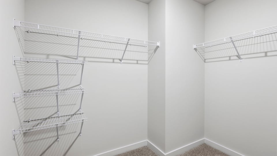 Closet with hanging storage racks.