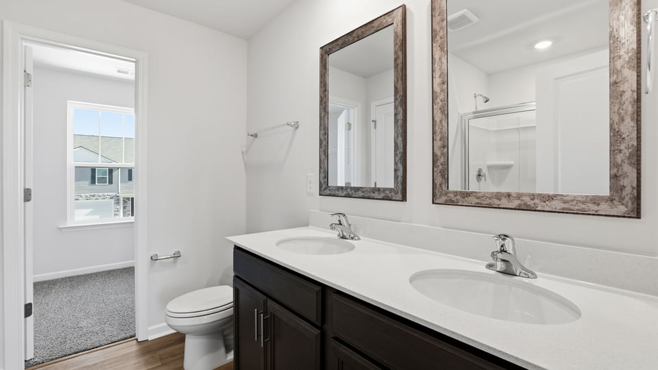 Bathroom with double vanity sink.