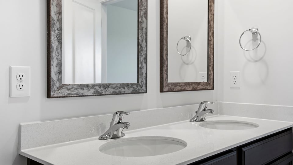 Bathroom with double vanity sink.