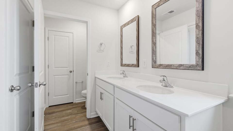 Bathroom with double vanity sink.