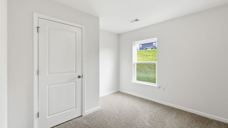 Hallway view upstairs with window.