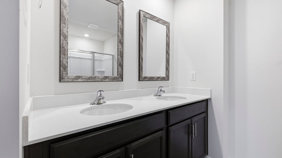 Bathroom with double vanity sink.