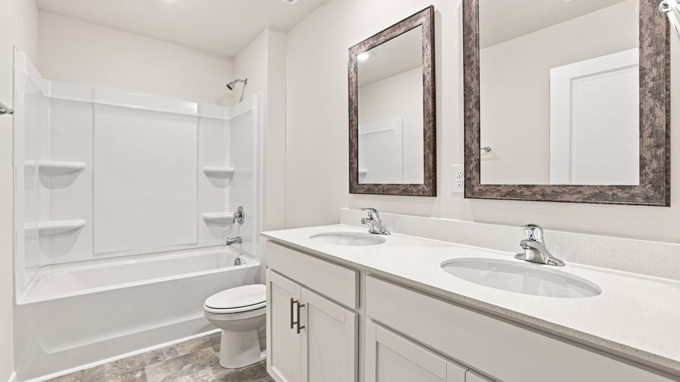 Bathroom with double vanity sinks.