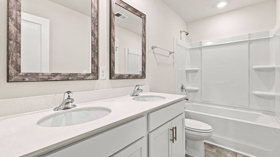 Bathroom with double vanity sinks.