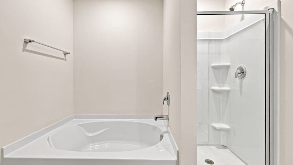 Primary bathroom with double vanity sinks.