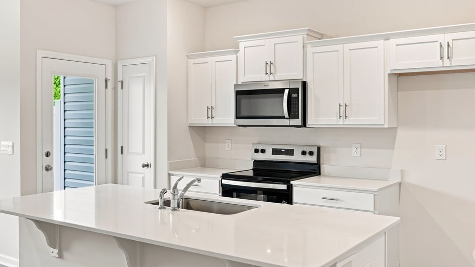 Kitchen with stainless steel appliances.