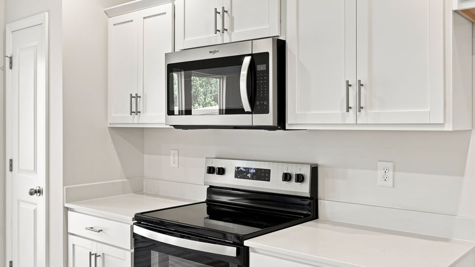 Kitchen with stainless steel appliances.