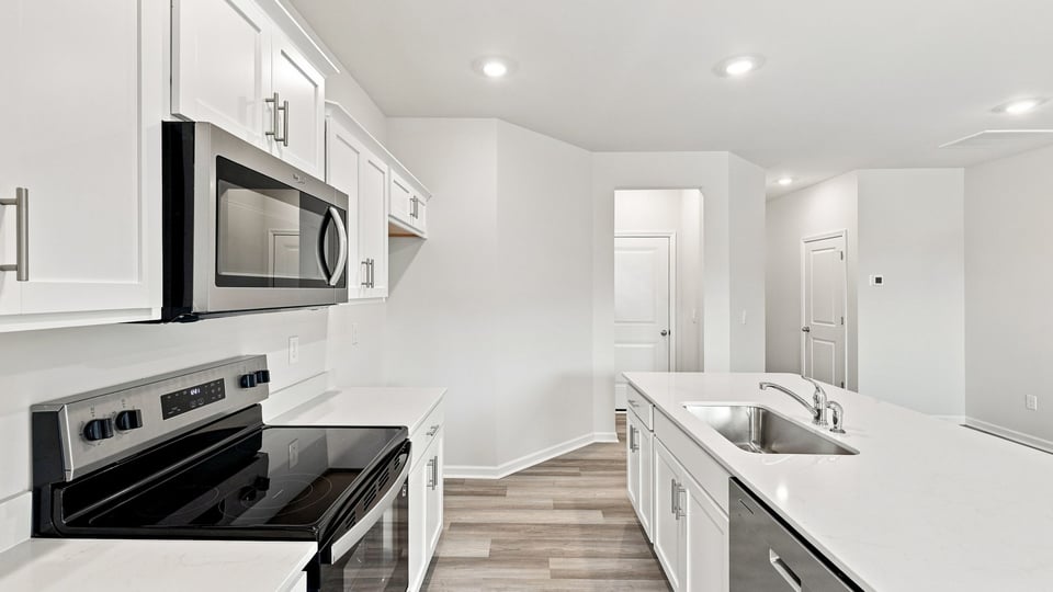 Kitchen with stainless steel appliances.