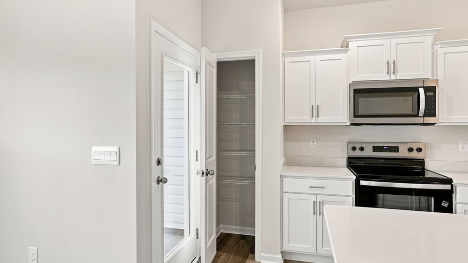 Kitchen with stainless steel appliances.