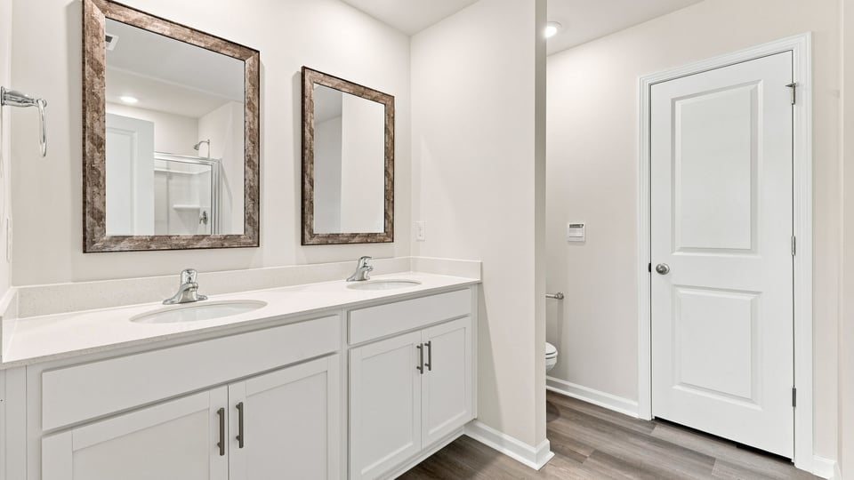 Bathroom with double vanity sink.