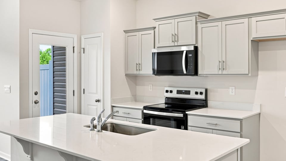 Kitchen with stainless steel appliances.