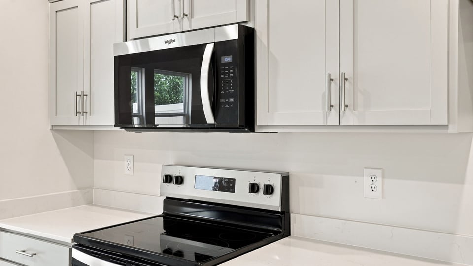 Kitchen with stainless steel appliances.