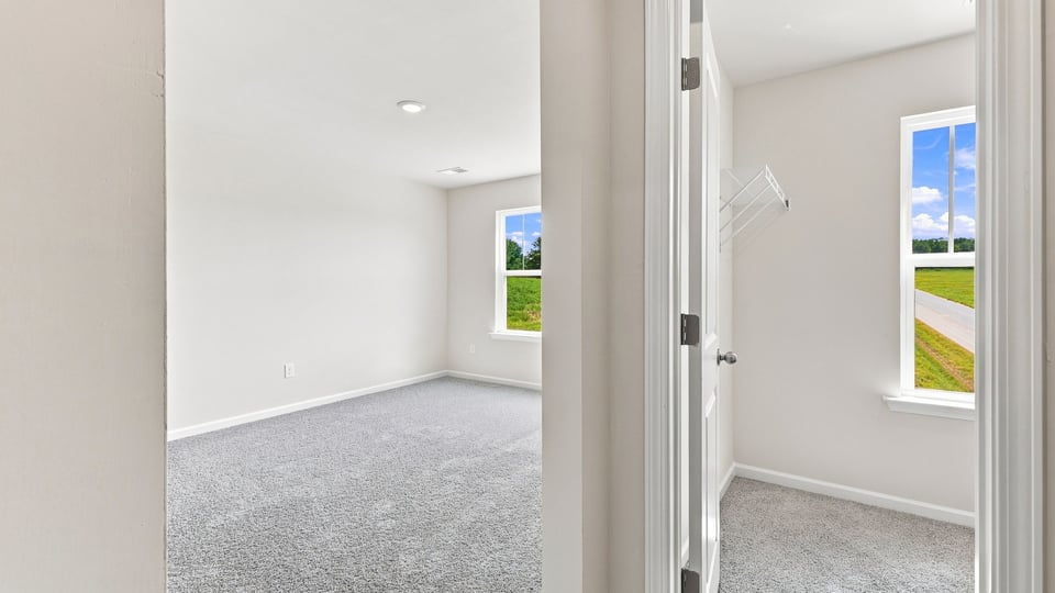 Bedroom with carpet.