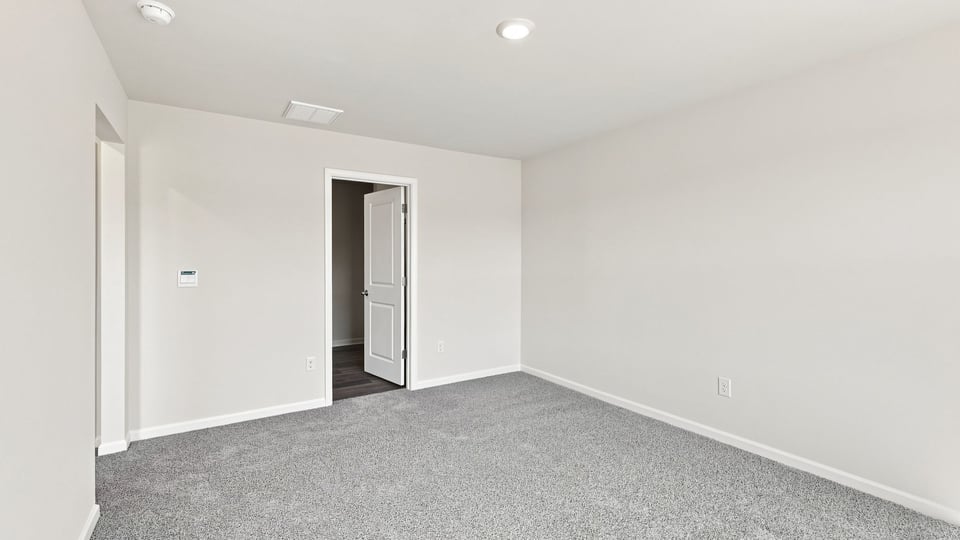 Bedroom with carpet.