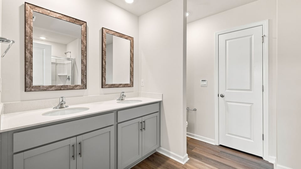 Bathroom with walk in shower.
