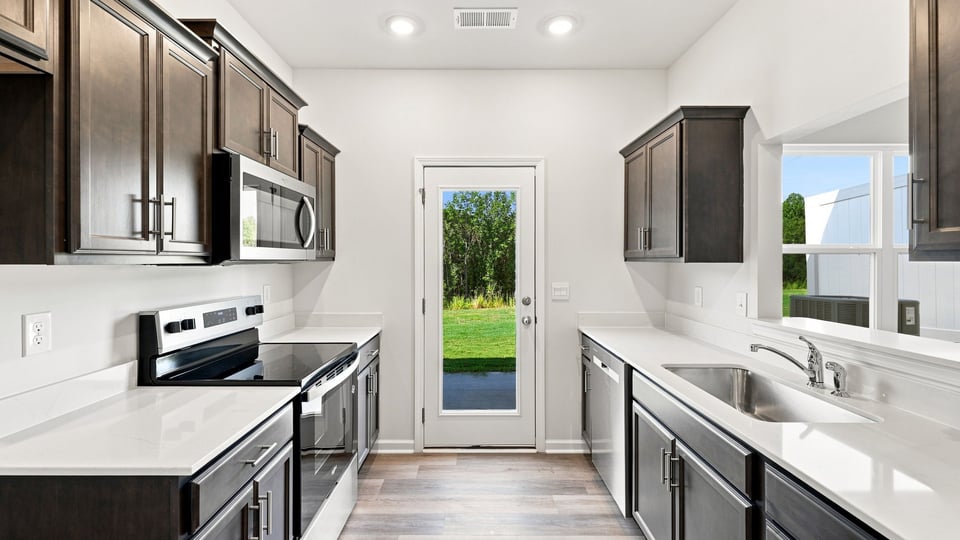 Kitchen with stainless steel appliances.