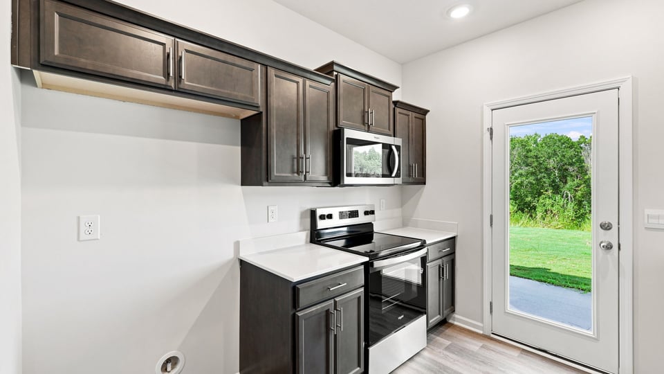 Kitchen with stainless steel appliances.