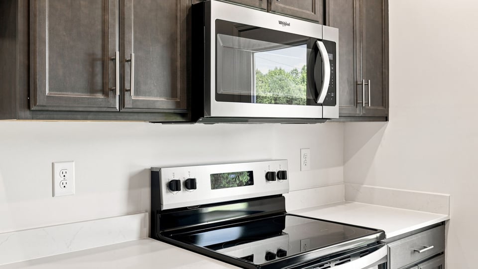 Kitchen with stainless steel appliances.