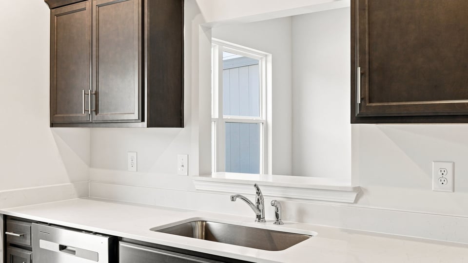 Kitchen with stainless steel appliances.