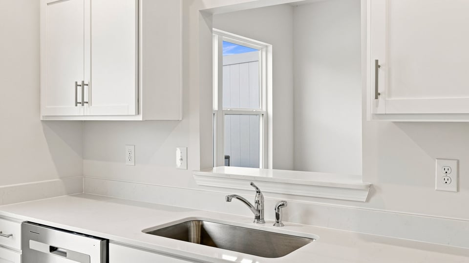 Kitchen with stainless steel appliances.