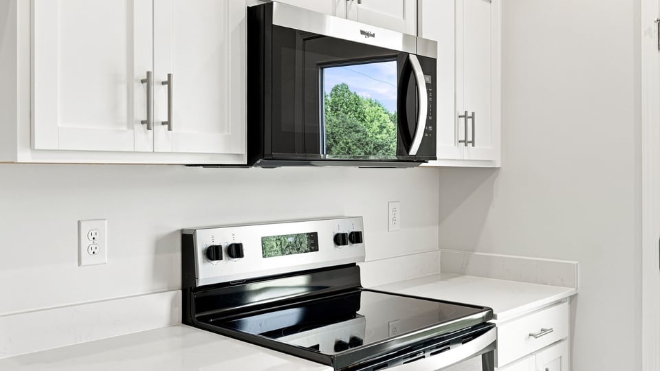 Kitchen with stainless steel appliances.
